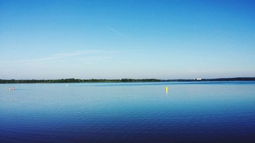 View of calm sea against blue sky