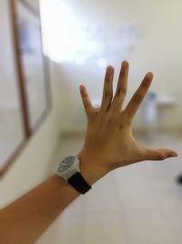 Close-up of hand against blurred background