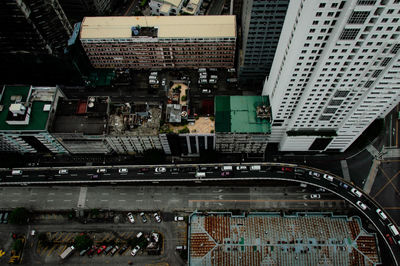 High angle view of road amidst buildings in city
