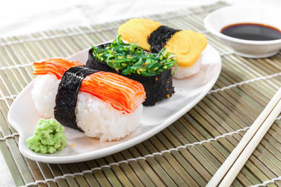 High angle view of sushi served in plate on table