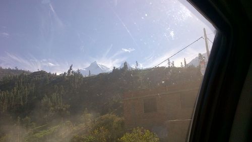 Panoramic view of town against sky