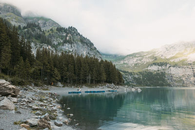 Scenic view of lake with mountains in background