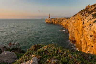 Scenic view of sea against sky during sunset