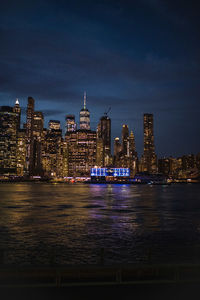 Illuminated buildings in city at night