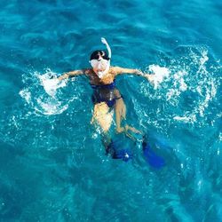 Woman swimming in pool