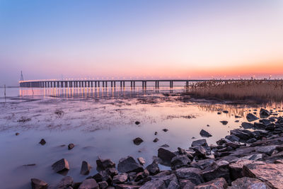 Scenic view of sea against sky during sunset