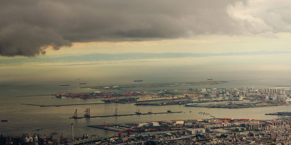 High angle shot of city against the sea