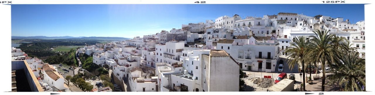 building exterior, architecture, built structure, transfer print, clear sky, residential structure, house, town, auto post production filter, residential building, high angle view, panoramic, blue, residential district, city, sunlight, townscape, day, crowded, outdoors