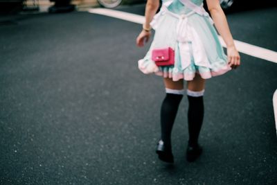 Low section of man standing outdoors