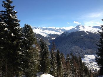 Scenic view of snow covered mountains