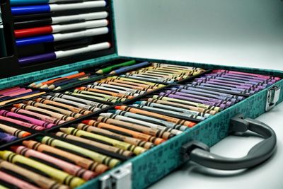 Close-up of multi colored pencils on table