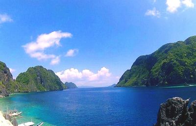 Scenic view of sea against cloudy sky