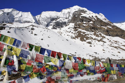 Low angle view of clothes drying against sky