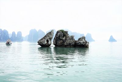 Panoramic view of sea against clear sky