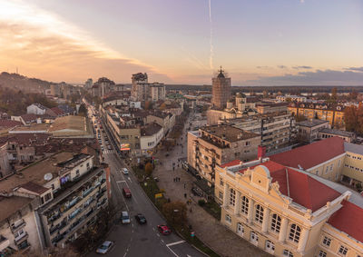 High angle view of city street against sky during sunset