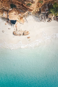 High angle view of man swimming in sea