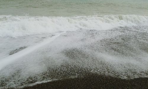 Waves splashing on beach