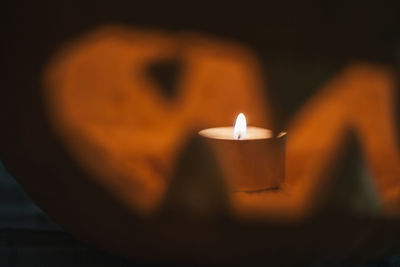 Close-up of burning candle