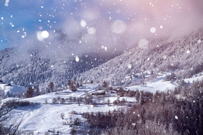 Scenic view of snowcapped mountains during winter