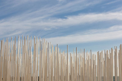 Wooden fence against sky