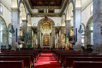  low angle view of empty seats in church