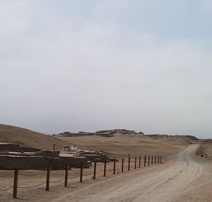 Scenic view of desert against clear sky