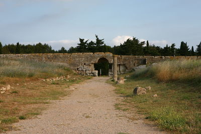 View of old building on field