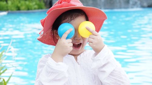 Close-up of girl holding toy