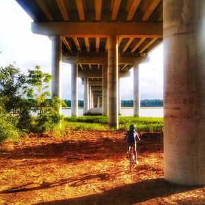 Rear view of woman on walkway