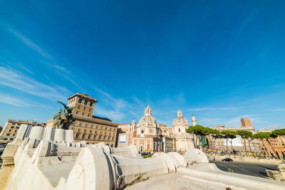 Buildings against blue sky