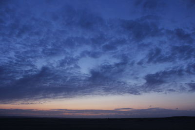 Scenic view of dramatic sky during sunset