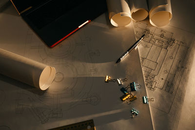 High angle view of blueprint on table