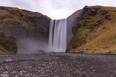 Scenic view of skogafoss against sky