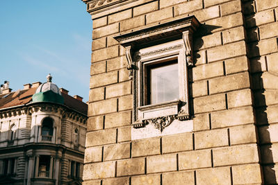 Low angle view of old building against sky