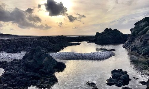 Scenic view of sea against sky during sunset