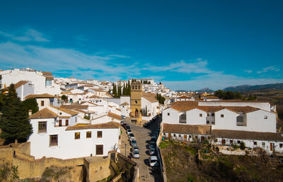 Beautiful aerial view of ronda with bridge, church and houses.
