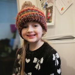 Portrait of happy boy in hat