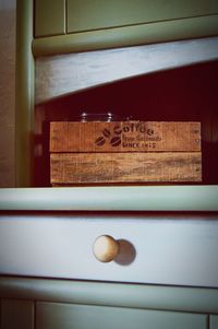 High angle view of balls on shelf at home