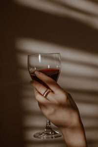 Close-up of woman holding drink