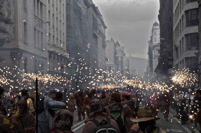 People in city at night