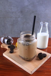 Close-up of drink in glass jar on table