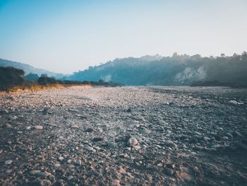 Scenic view of land against clear sky