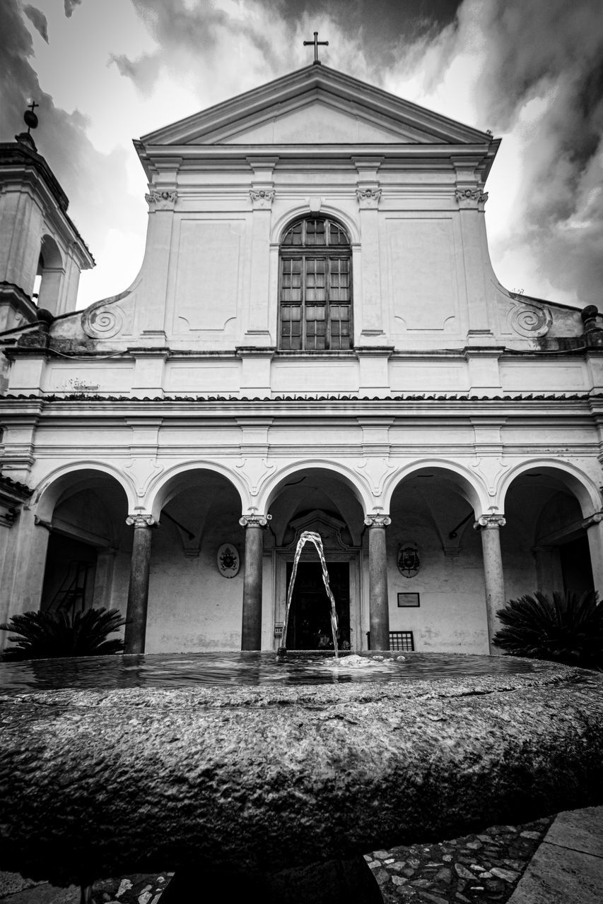 architecture, built structure, black and white, building exterior, monochrome, white, monochrome photography, arch, black, sky, building, cloud, religion, nature, no people, history, place of worship, darkness, the past, belief, house, low angle view, spirituality, outdoors, day, city, facade, travel destinations