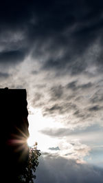 Low angle view of silhouette building against sky during sunset