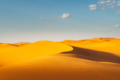 Scenic view of desert against sky