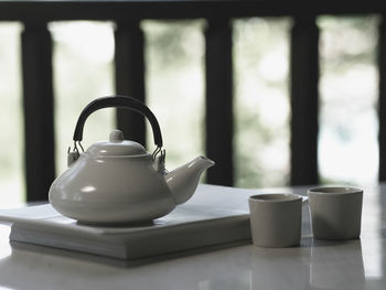 Close-up of tea cup on table