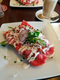 Close-up of salad in plate on table