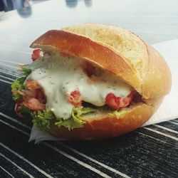 Close-up of hamburger on table