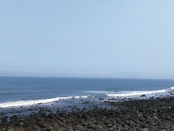 Scenic view of sea against clear sky