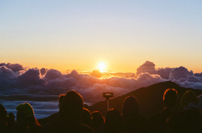 Sun shining through mountains